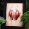 Boucles d’oreille longues rouge en ailes de fée