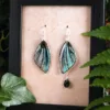 Boucles asymétriques iridescent en ailes de fée fait main