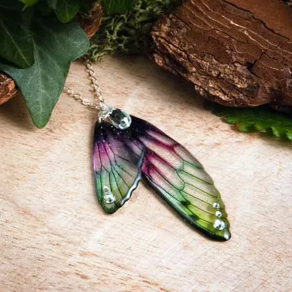 Sautoir artisanal en ailes de fée - Plume de Paon