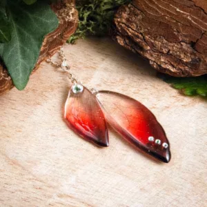 Sautoir en argent avec ailes de fée rouge