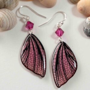 Boucles d’oreilles féeriques aux ailes roses et noires